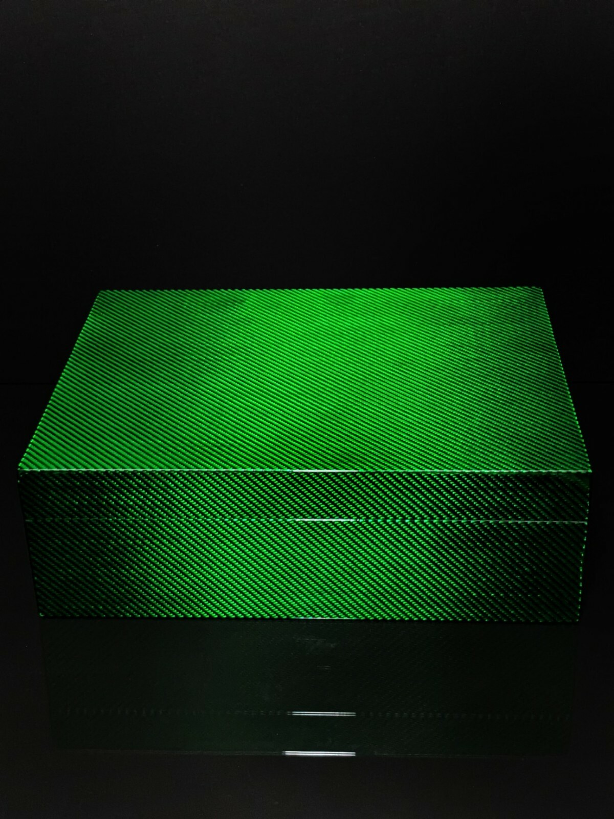 Green Carbon Fiber Humidor Measures 13 1/2 ” L x 10 3/4″ W x 4 3/8 ” H