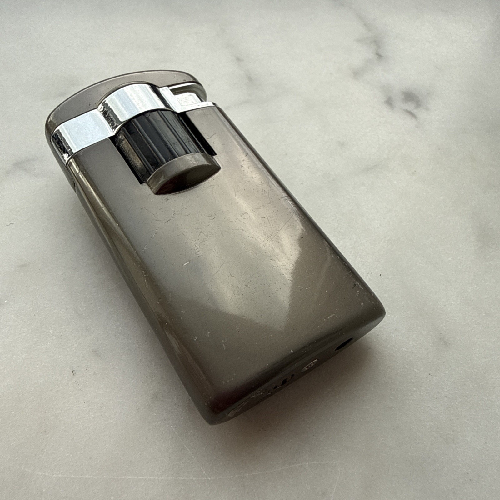 Gray Silver Flip Butane Cigarette Lighter. Sleek Modern