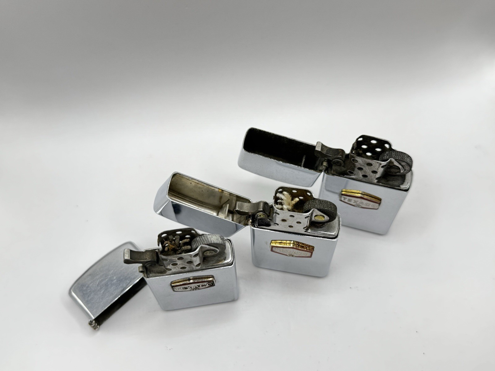 ZIPPO TEXACO EMBLEM POLISHED CHROME SLIM LIGHTERS Lot of 3 1967 1972 1976