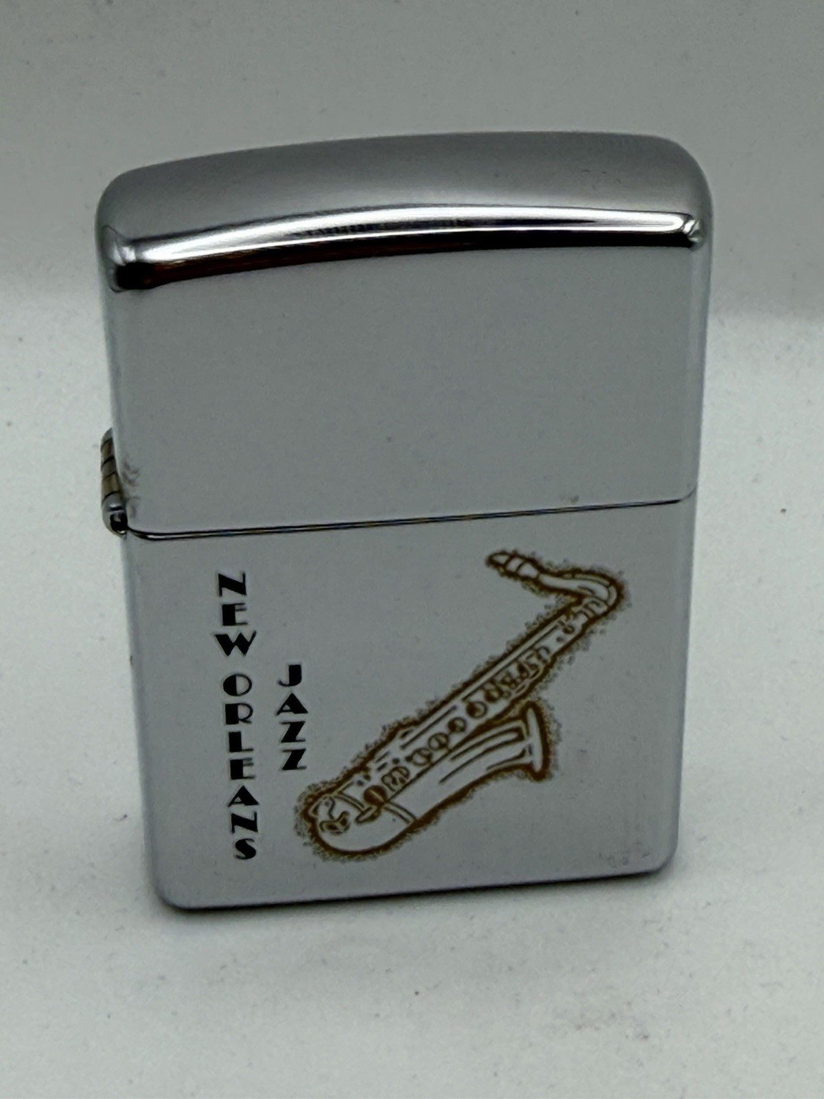Vintage 2000 New Orleans Jazz Saxophone High Polish Chrome Zippo Lighter New