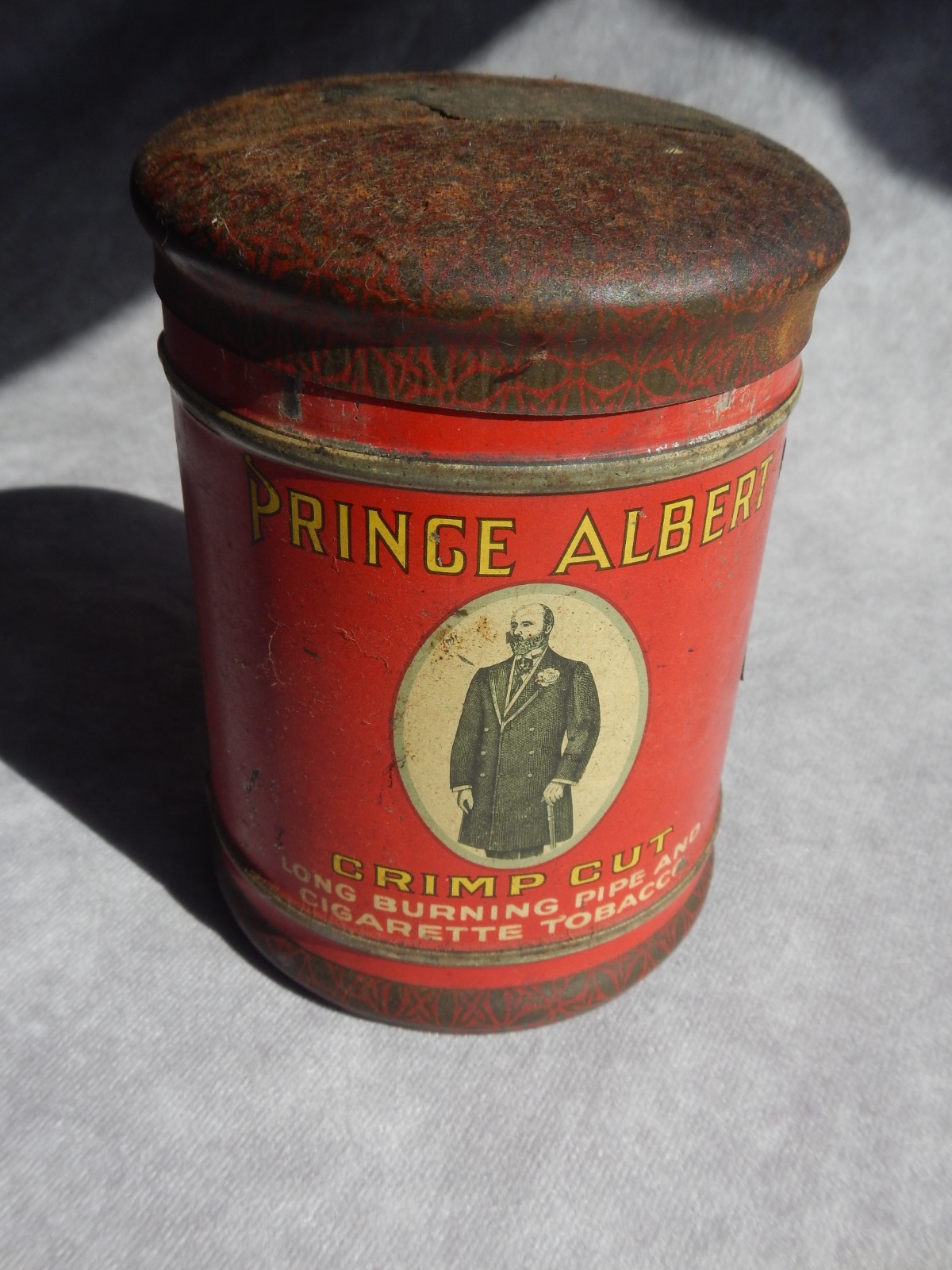 VINTAGE PRINCE ALBERT ROUND CANISTER TOBACCO TIN “Does Not Bite the Tongue” 