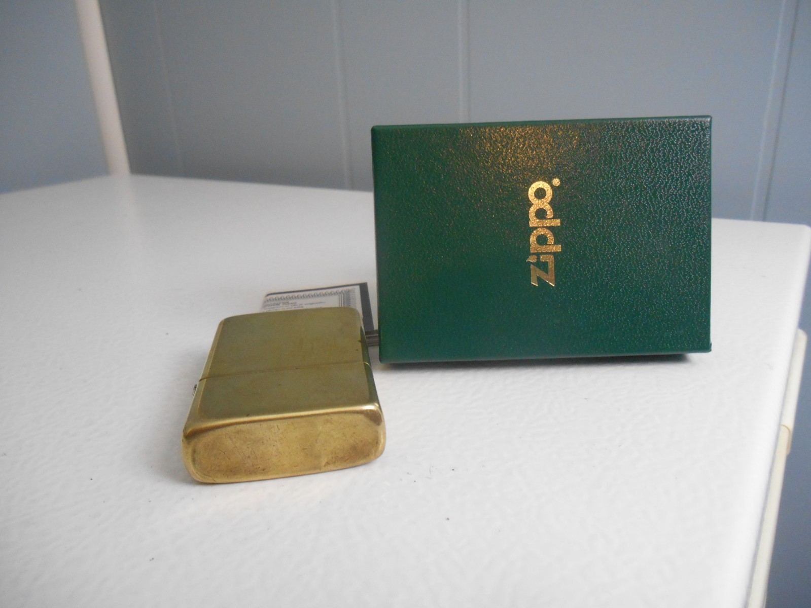VINTAGE ZIPPO BRADFORD PA. 1932- 1987 BRASS LIGHTER IN BOX WITH PAPERS