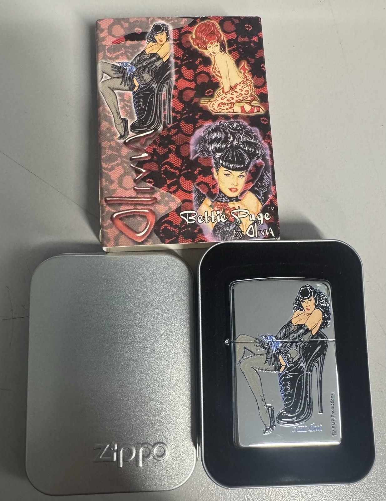 ZIPPO 2003 OLIVIA BETTIE PAGE BONDAGE PINUP GIRL LIGHTER SEALED IN BOX G184