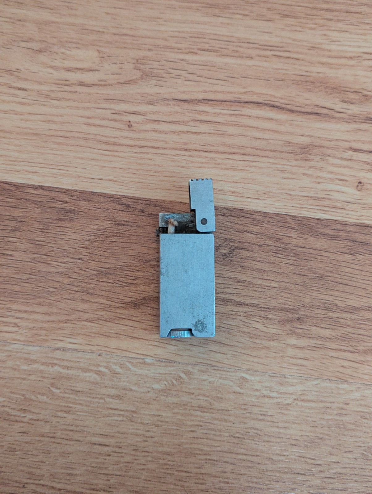 Vintage World War II aluminum hinge lighter OBO