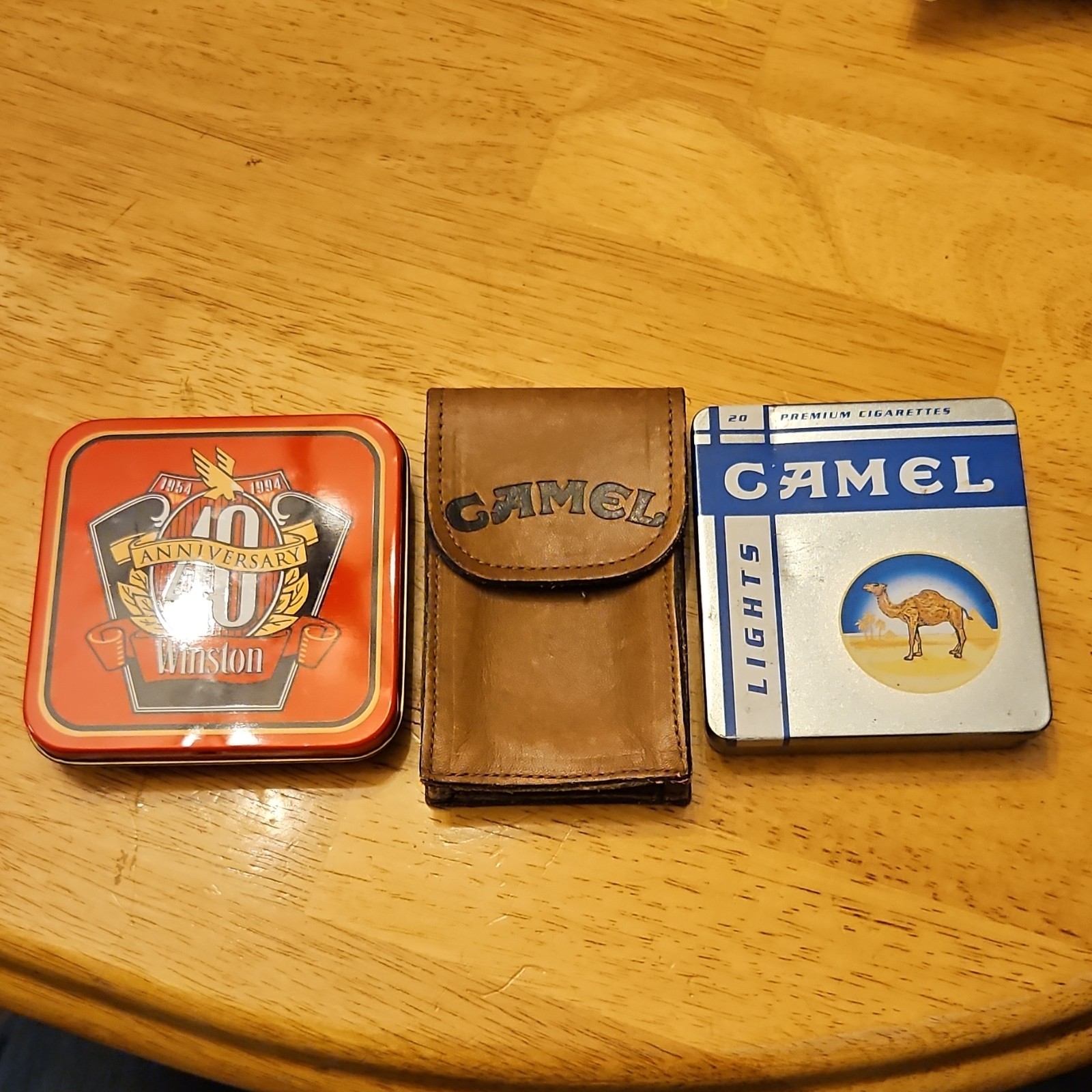 Winston Collectible Lighter with Case and a camel smoking tin and leather holder