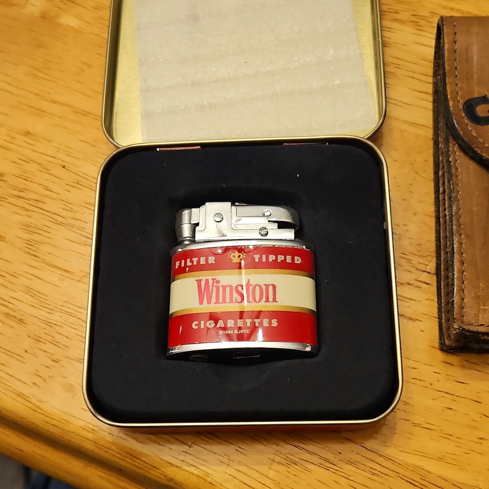 Winston Collectible Lighter with Case and a camel smoking tin and leather holder