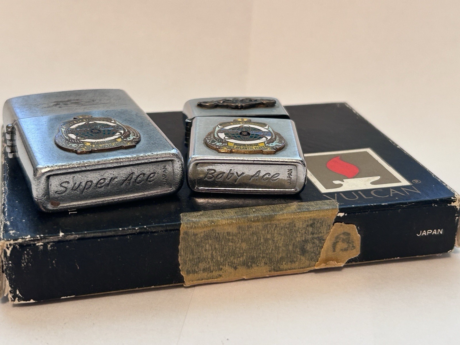 US Navy USS Abraham Lincoln 602 Super Ace and Baby Ace Vulcan lighters 1960s