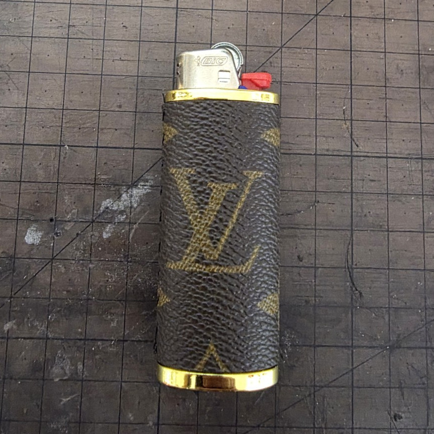 Monogram print lighter cover / wrap brown & gold (lighter shown)