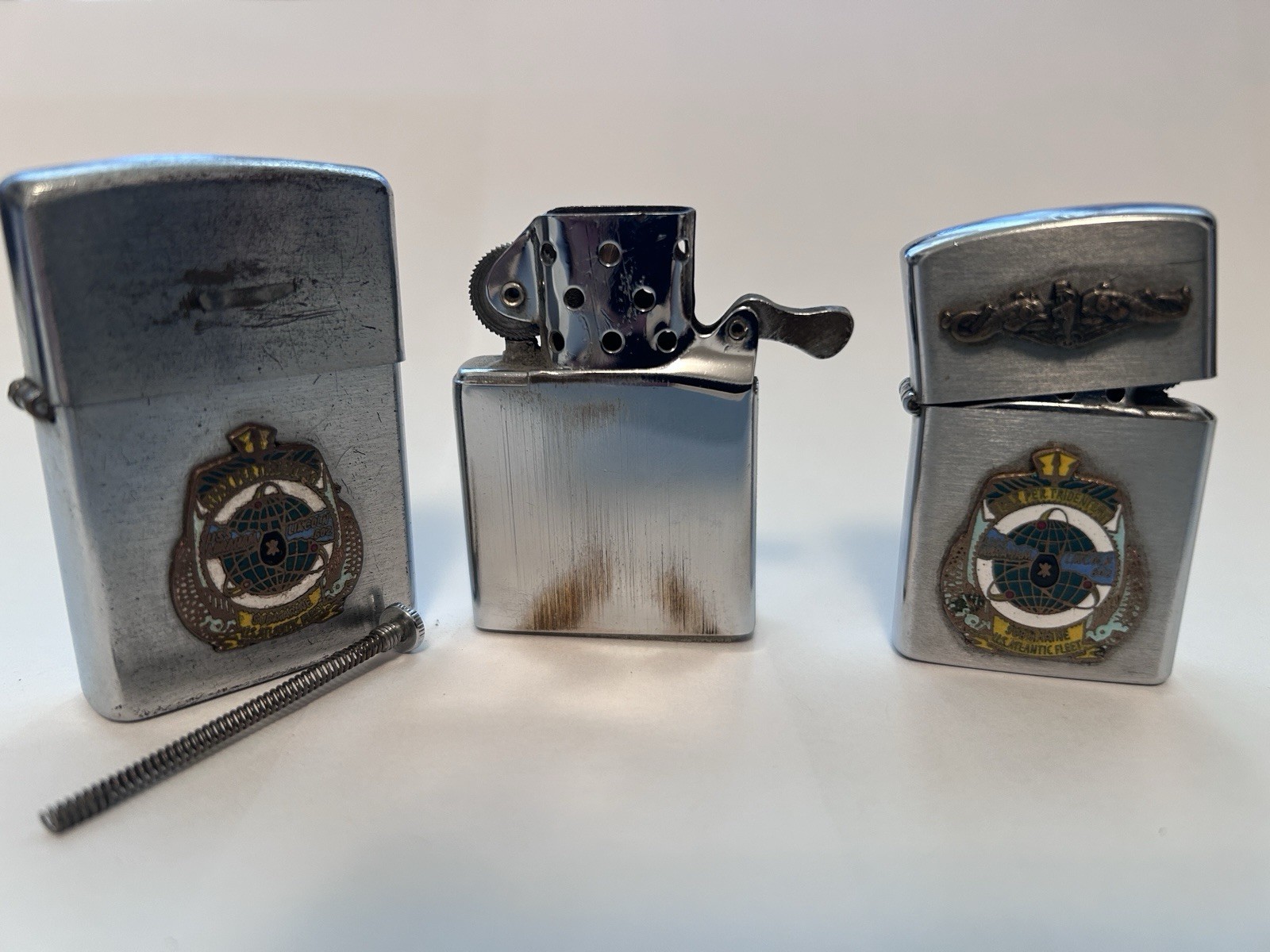 US Navy USS Abraham Lincoln 602 Super Ace and Baby Ace Vulcan lighters 1960s