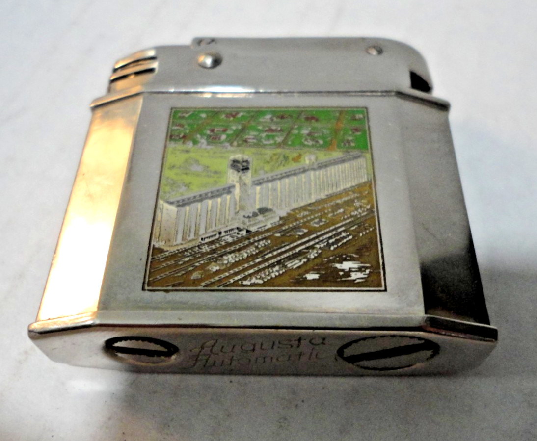 C1980 AUGUSTA AUTOMATIC LIGHTER .MADE IN GERMANY. VERY RARE AD.MINIMUM USE