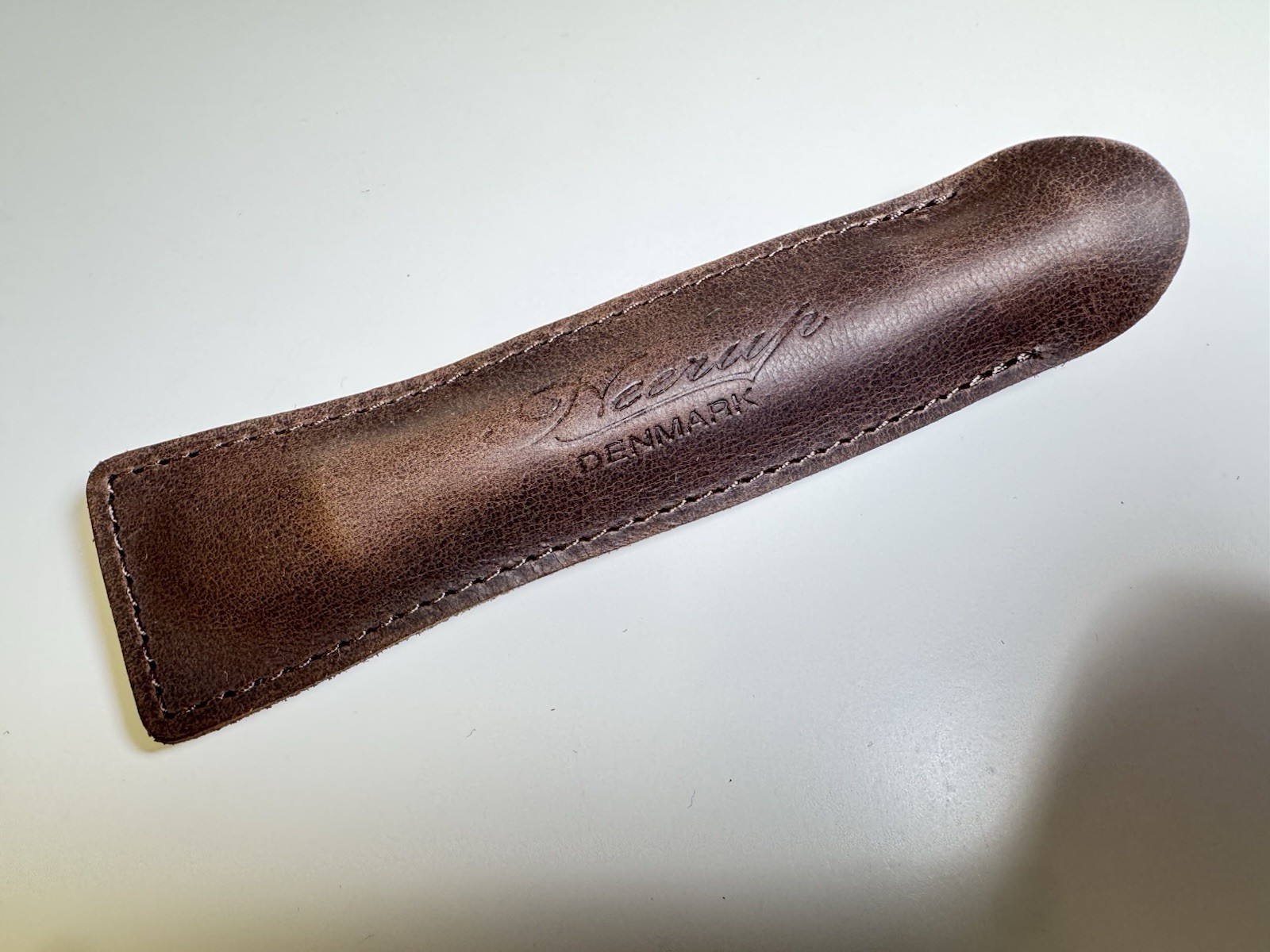 neerup pipe tamper tool in genuine brown leather pouch made in denmark