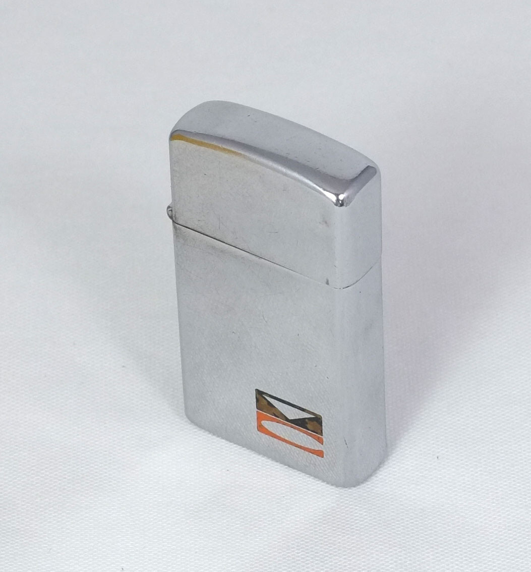 Vintage 1968 Zippo Slim Polished Chrome Advertising Lighter