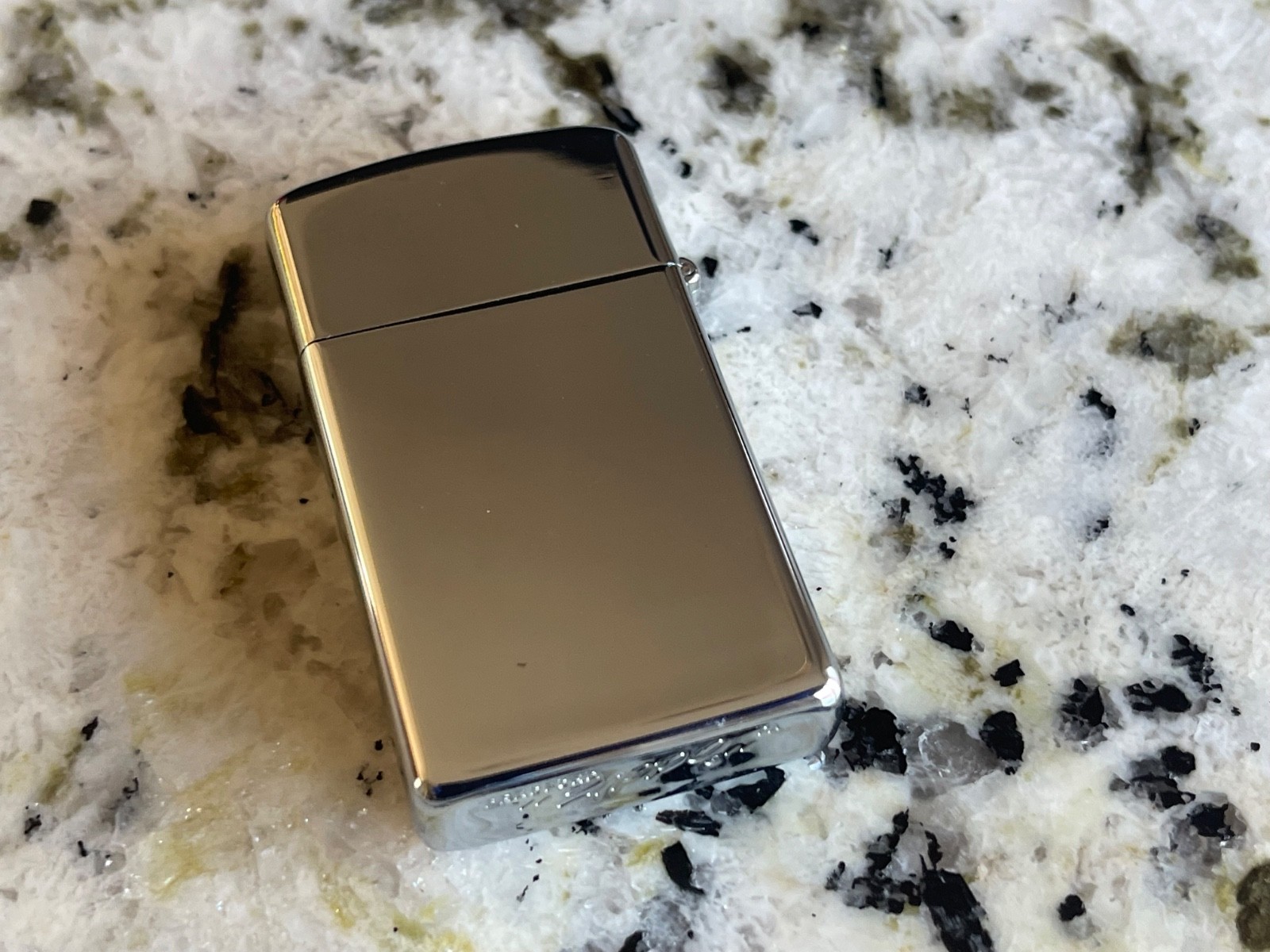 Mint 1978 Zippo Slim Lighter – Polished Chrome, Black Star & Moon Logo, Unstruck