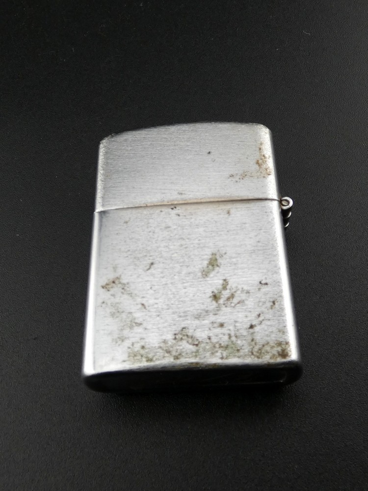 Vintage Vietnam Era Snoopy F*** IT Snoopy on Dog House Silver Lighter