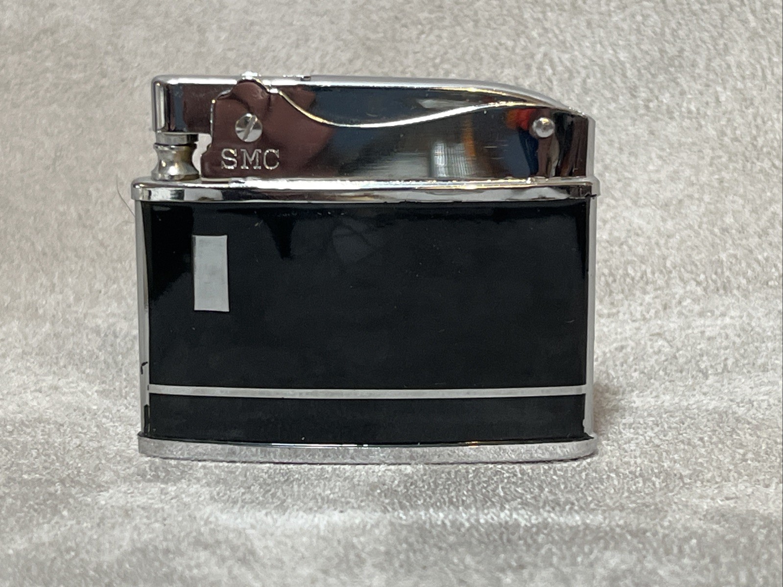 Vintage SMC Supreme slim/flat chrome & black enamel lighter. New old stock Works