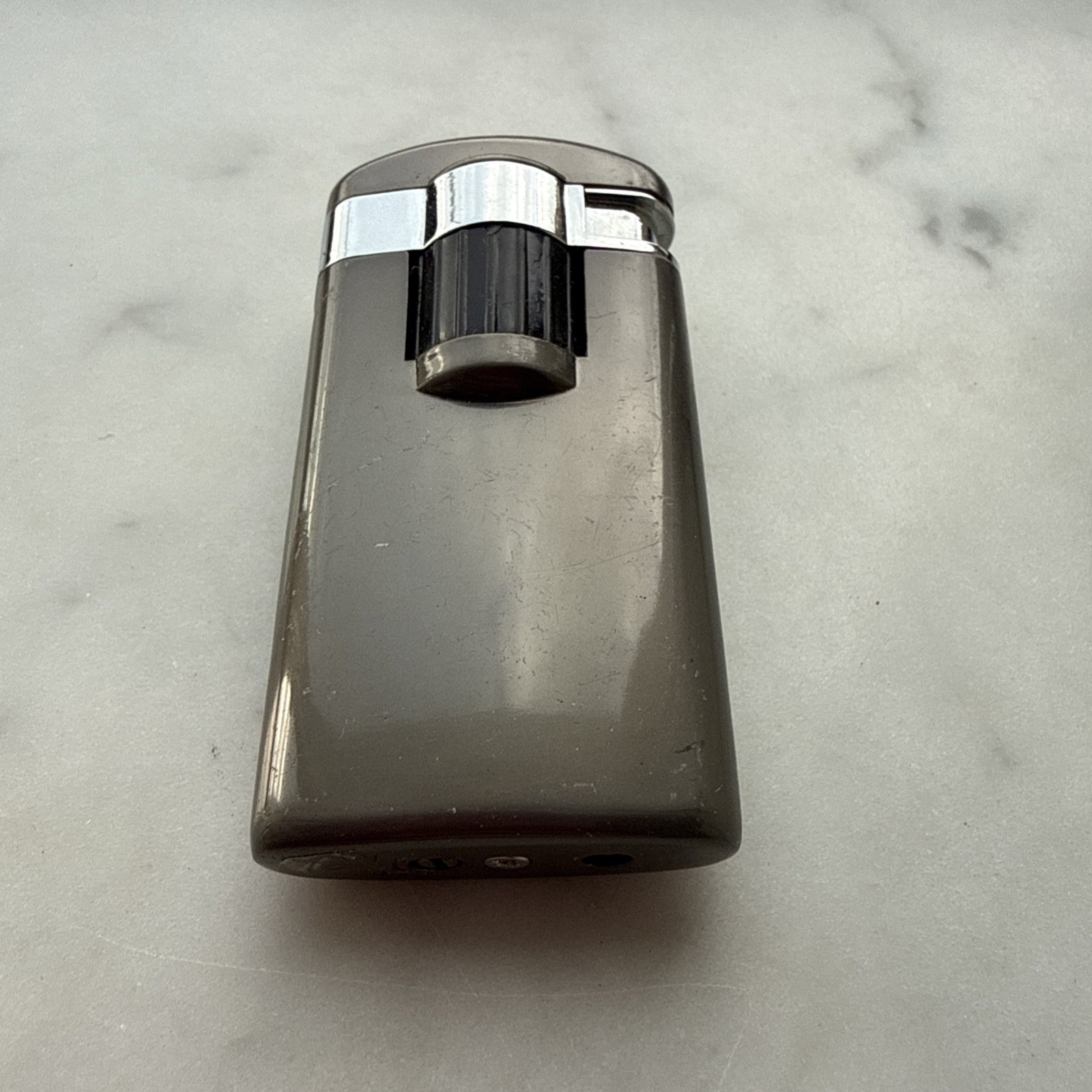 Gray Silver Flip Butane Cigarette Lighter. Sleek Modern