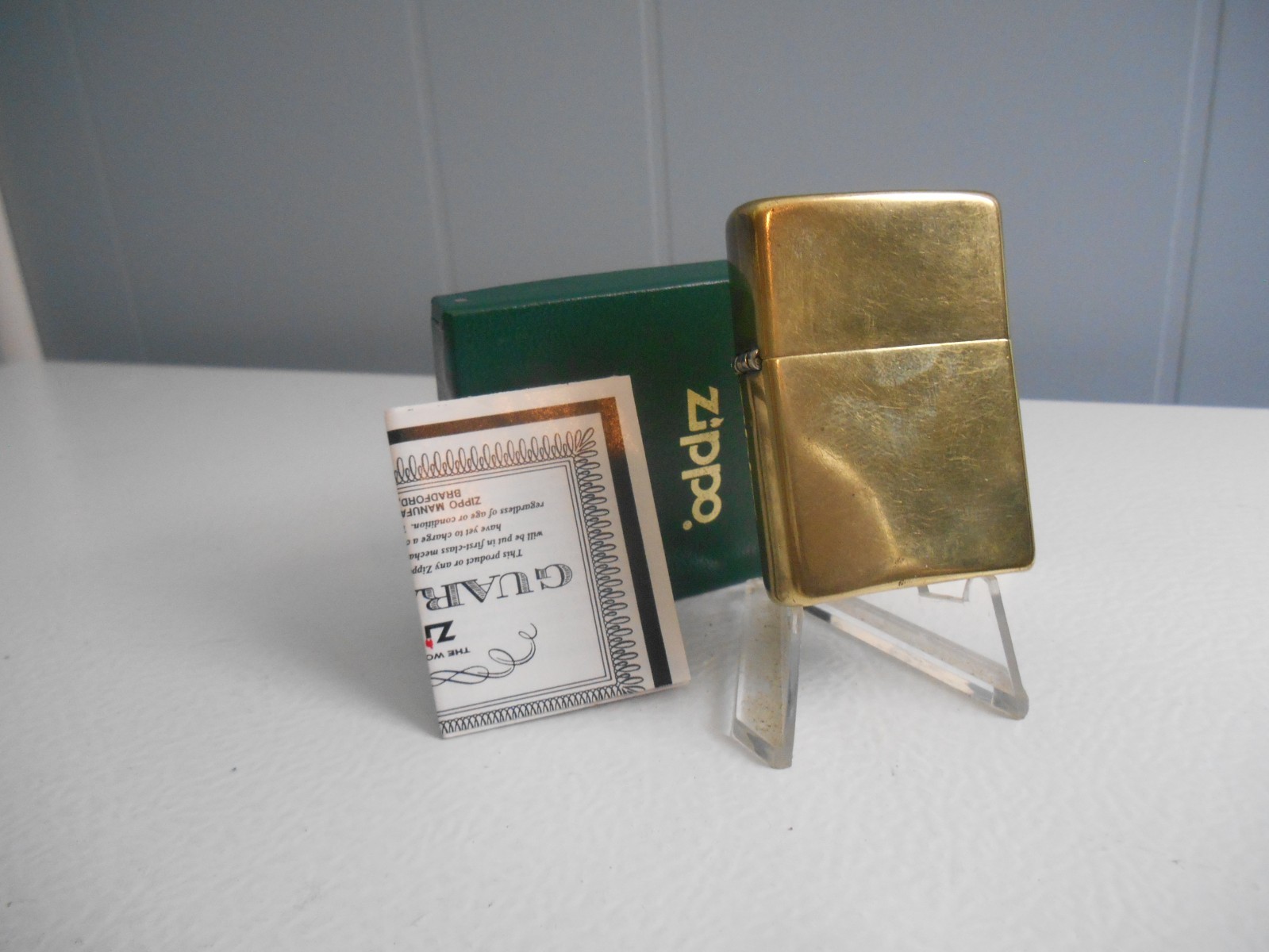 VINTAGE ZIPPO BRADFORD PA. 1932- 1987 BRASS LIGHTER IN BOX WITH PAPERS