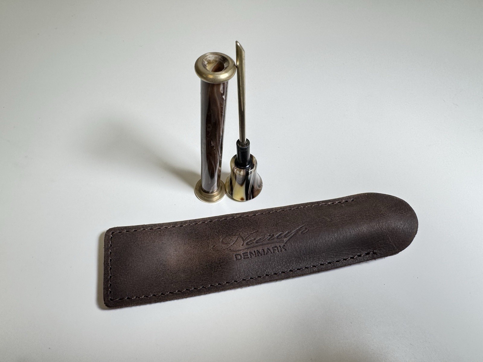 neerup pipe tamper tool in genuine brown leather pouch made in denmark