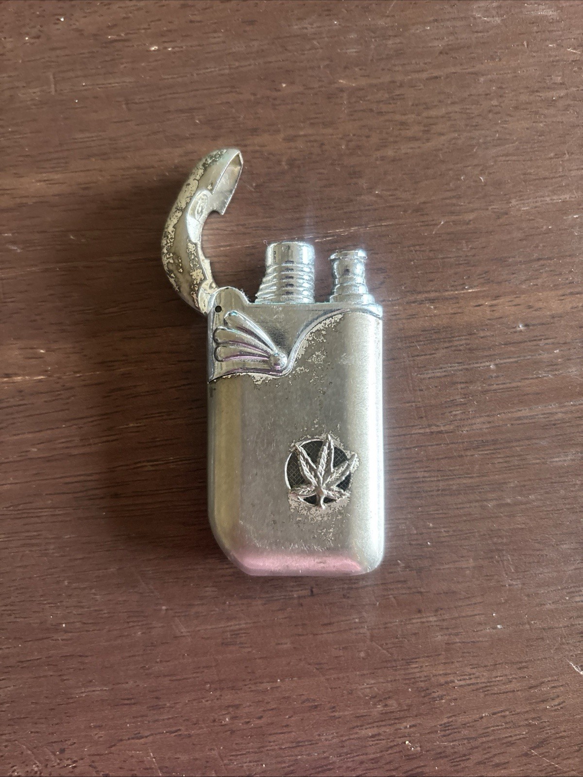 Vintage Butane Lighter Silver And Bronze With Cannabis Leaf Design. Refillable