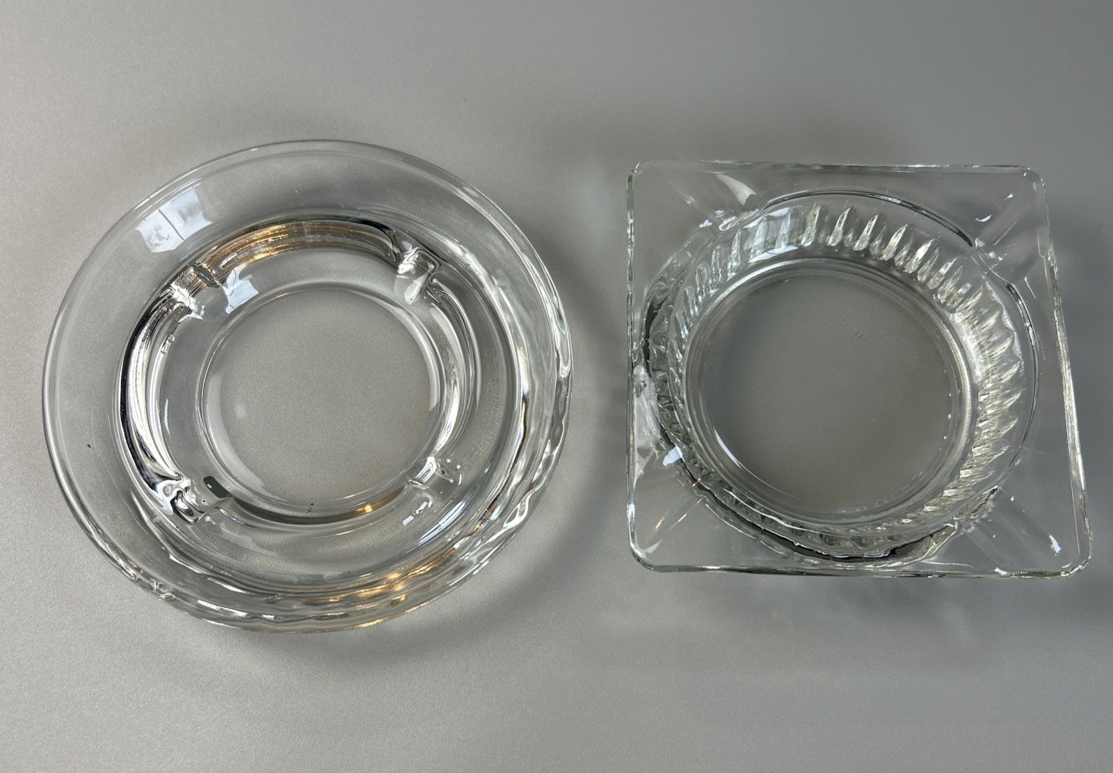 Lot of 2 Clear Glass Ashtrays One Round & One Square 4 Slots Each 4 and 5 Inches