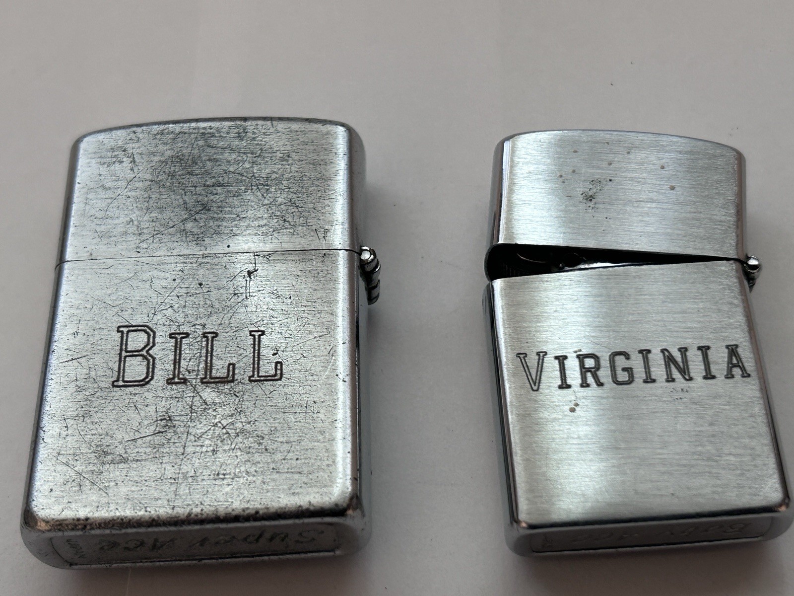 US Navy USS Abraham Lincoln 602 Super Ace and Baby Ace Vulcan lighters 1960s