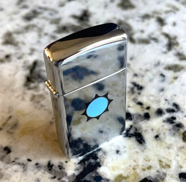 Mint 1978 Zippo Slim Lighter – Polished Chrome, Black Star & Moon Logo, Unstruck
