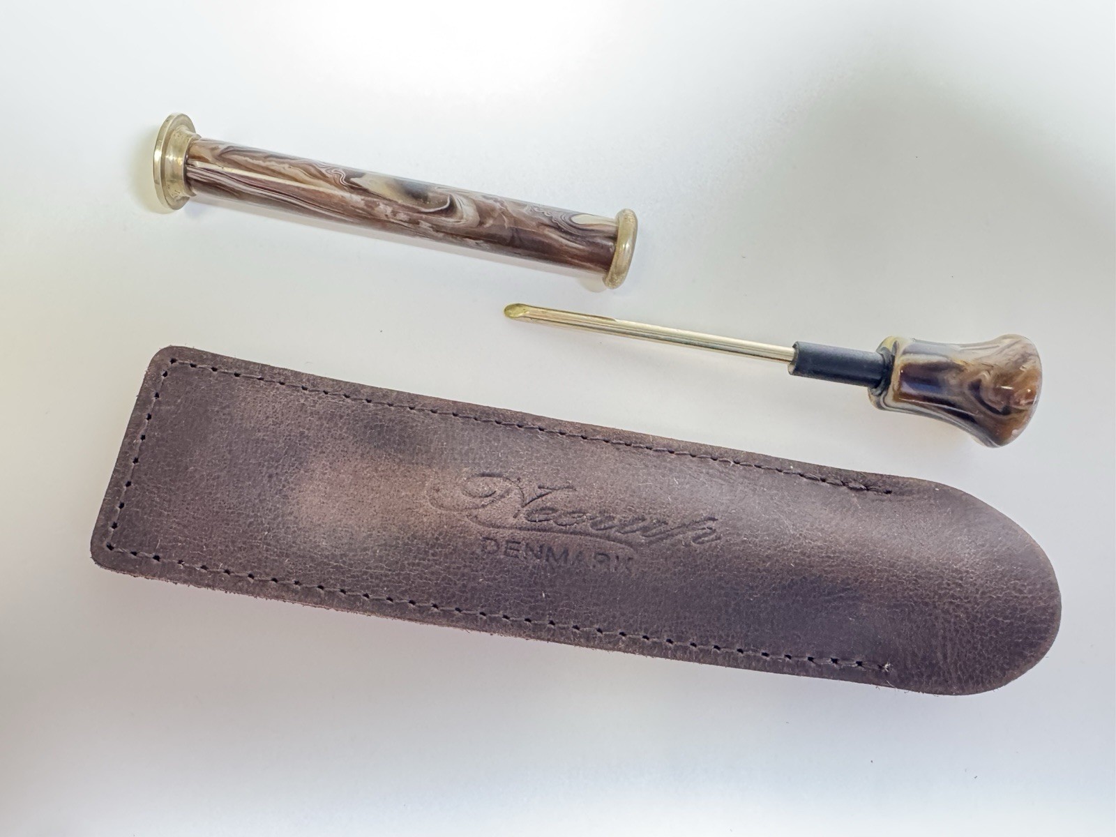 neerup pipe tamper tool in genuine brown leather pouch made in denmark