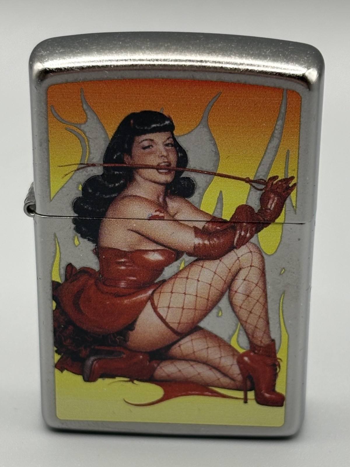 Olivia Zippo Bettie Page “Don’t Tread On Me” in Chrome w/Flames with Signed Box