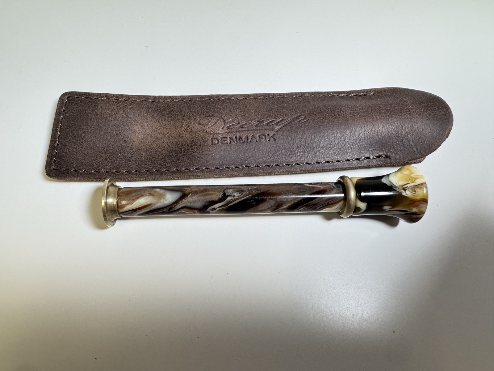 neerup pipe tamper tool in genuine brown leather pouch made in denmark