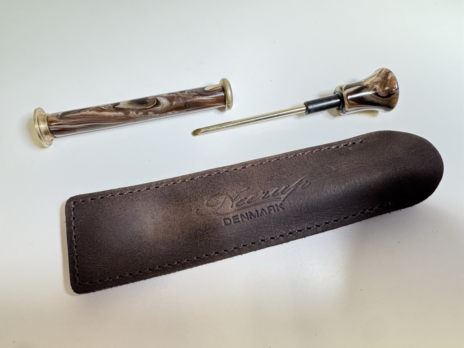 neerup pipe tamper tool in genuine brown leather pouch made in denmark