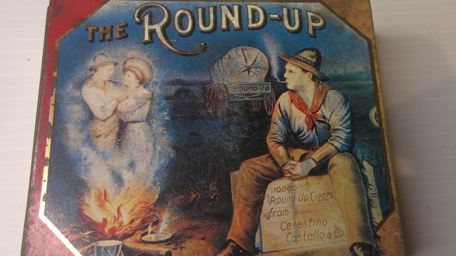vintage advertising empty tin Round up cigarettes ghost figures in smoke Z131