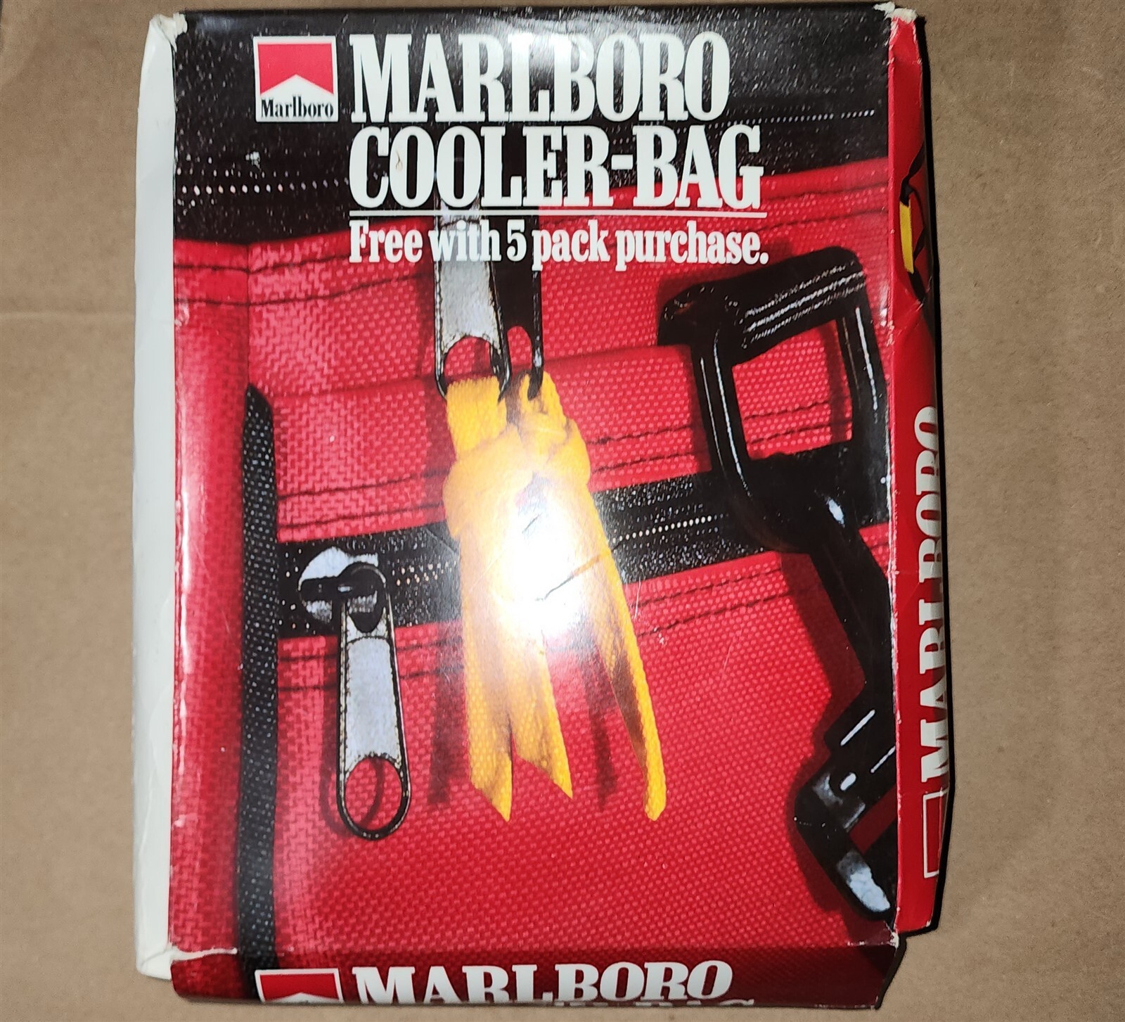 1995 MARLBORO COOLER-BAG NEW IN PACKAGE BOX MEASURES 8.5″ X 11″ AND IS BANGED UP
