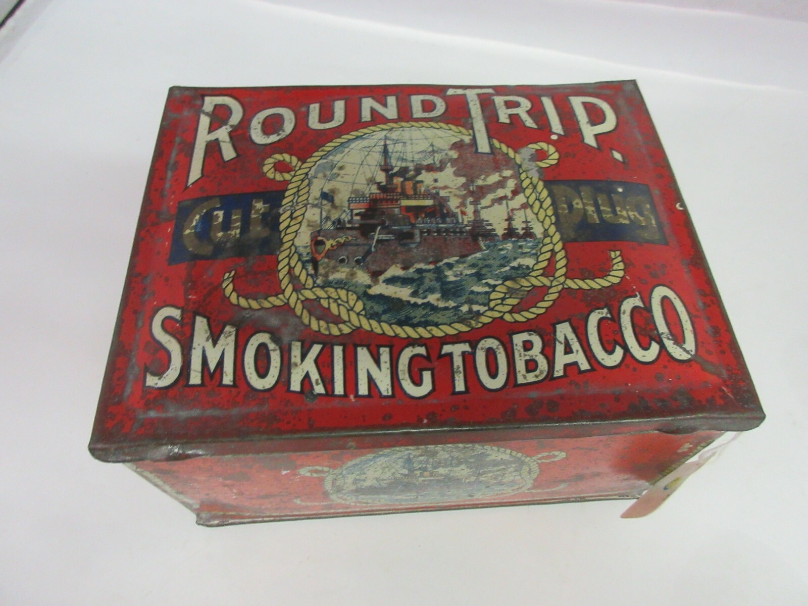 VINTAGE ADVERTISING EMPTY ROUND TRIP CUT PLUG TOBACCO TIN 243