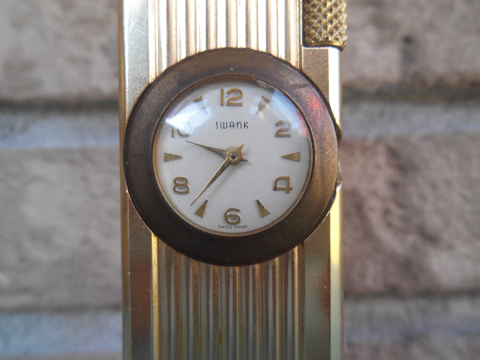 VINTAGE CYGNUS LIFT ARM TABLE LIGHTER WORKS WITH SWANK CLOCK. WIND STEM MISSING