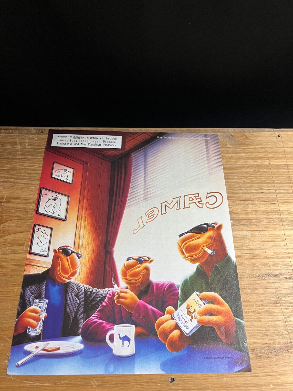 1997 VINTAGE 8.5X11 PRINT Ad FOR JOE CAMEL ULTRA CIGARETTES 3 CAMELS IN DINER