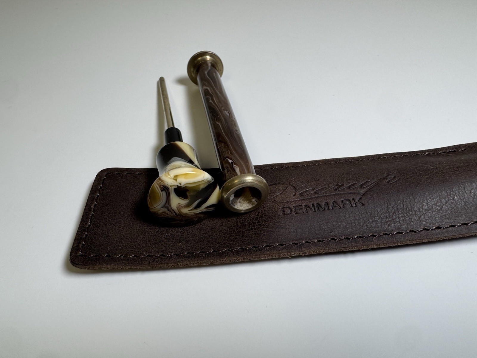 neerup pipe tamper tool in genuine brown leather pouch made in denmark