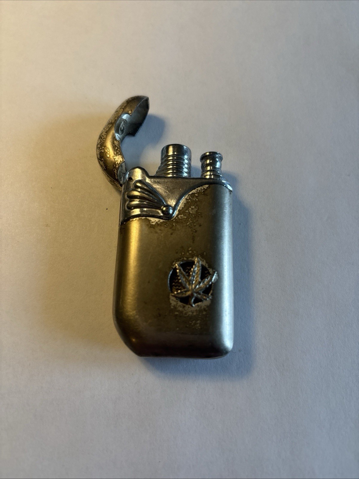 Vintage Butane Lighter Silver And Bronze With Cannabis Leaf Design. Refillable