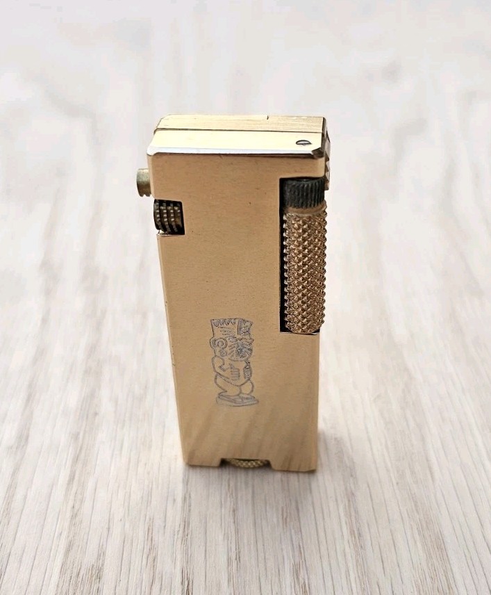 RARE Vtg. Penguin Cygnus Cigarette Lighter Trader Vics