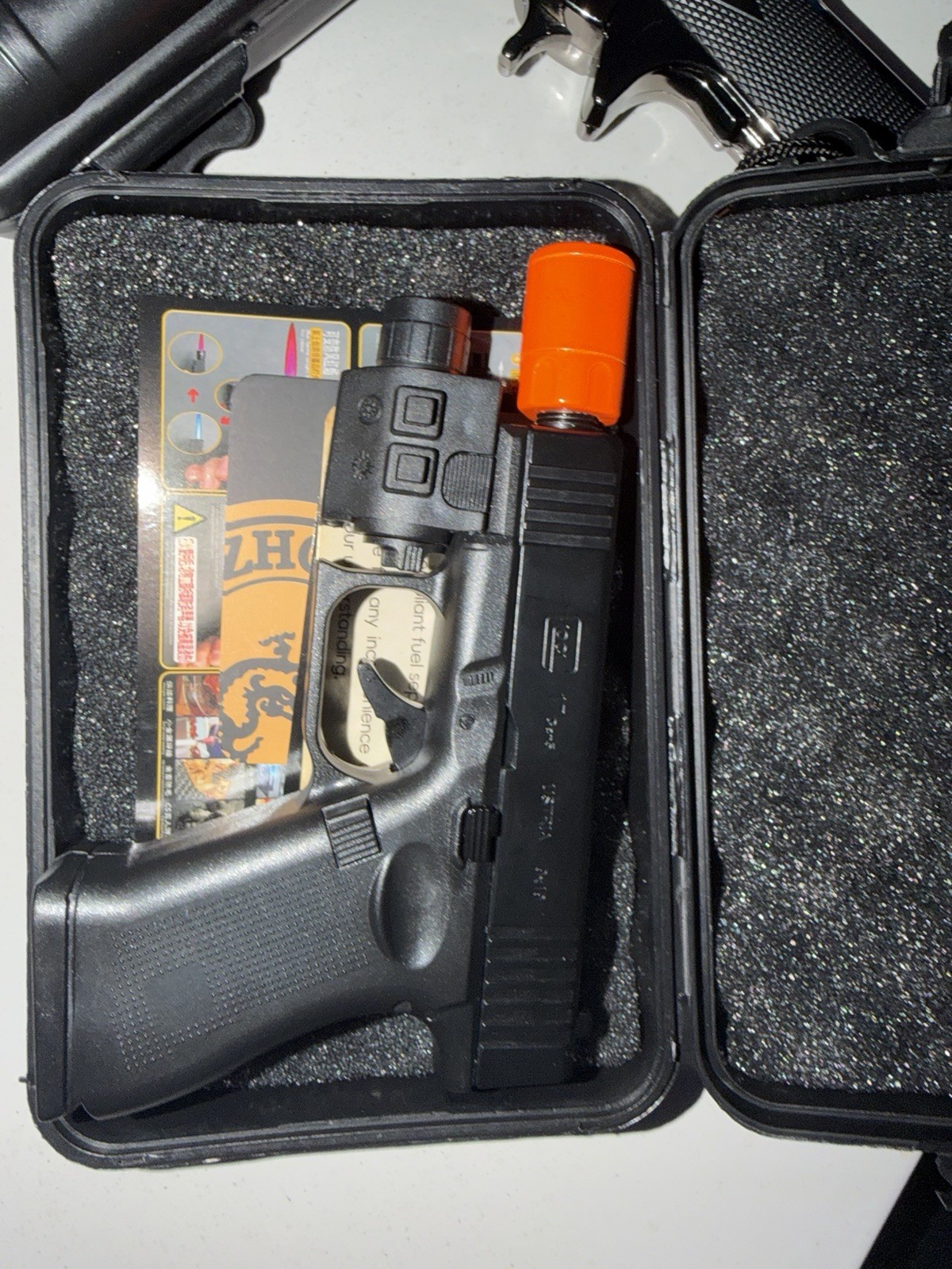 Gun-Shaped Butane Lighter with High-Temperature Ceramic Nozzle, Black Orange ￼