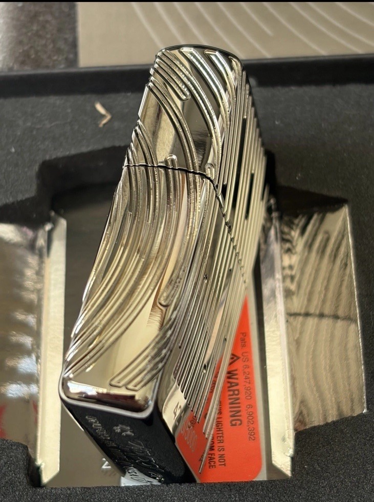 ZIPPO 2026 COLLECTIBLE OF THE YEAR, AMERICAS CARVED BLACK ICE ARMOR LIMITED 5000