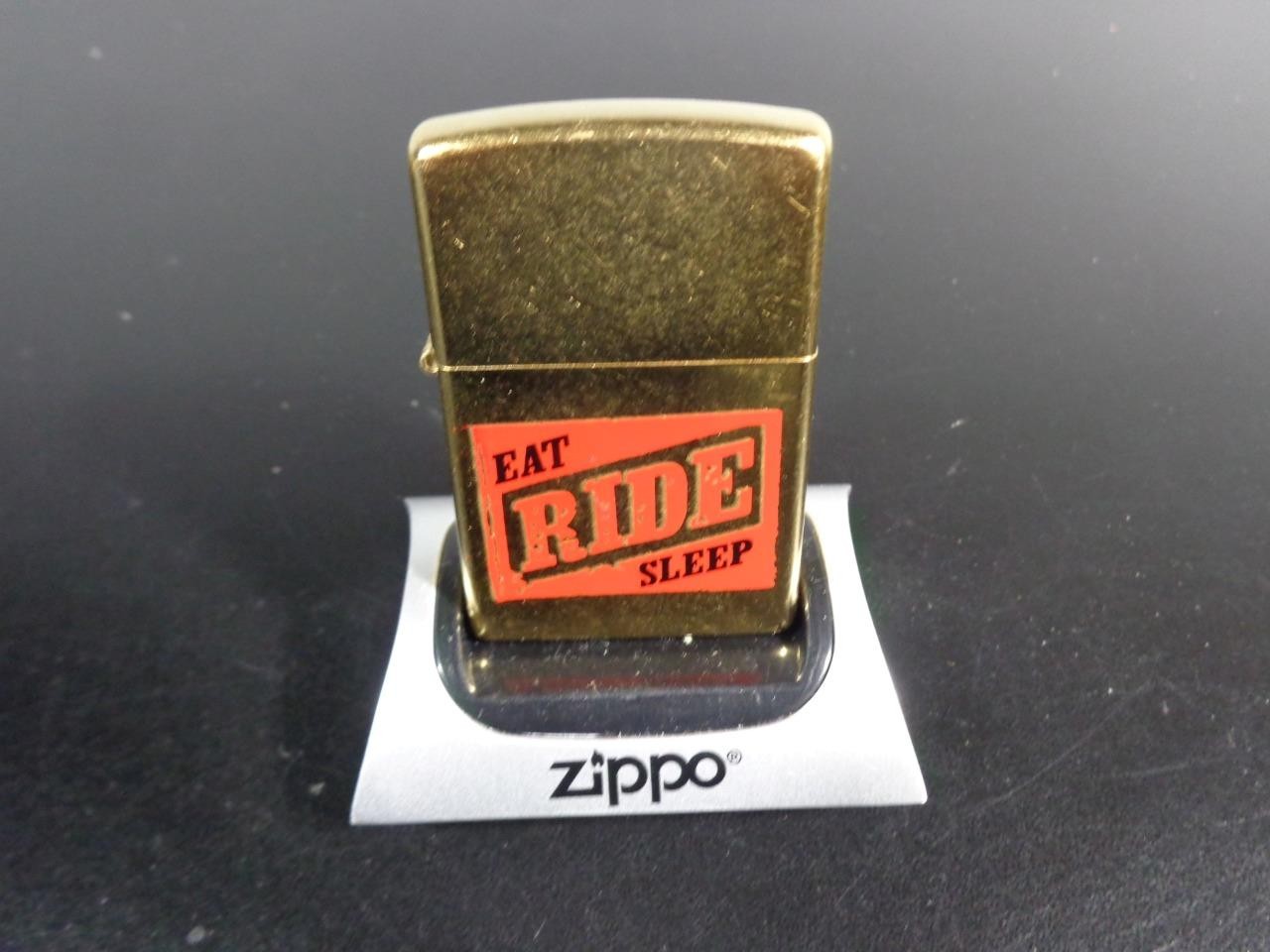 ZIPPO UNFIRED 2004 BRUSHED BRASS PROMOTIONAL CIGARETTE LIGHTER EAT RIDE SLEEP
