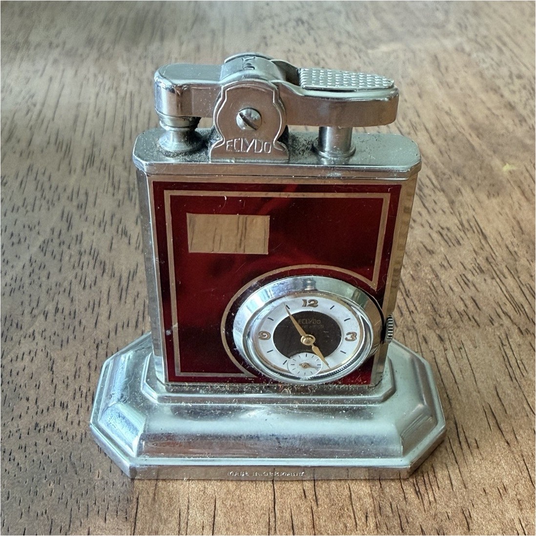 Elydo Silver & Red Table Lighter w/ Built-In Clock – Silver Metal, Red Panel
