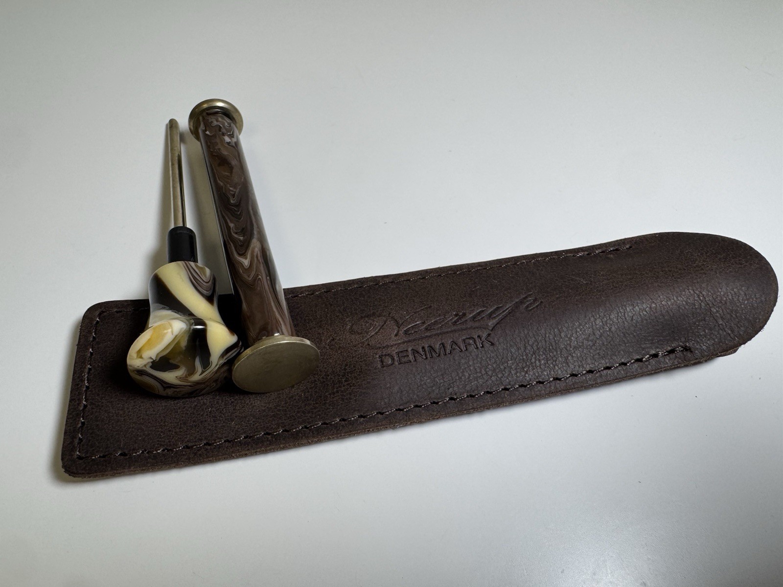 neerup pipe tamper tool in genuine brown leather pouch made in denmark