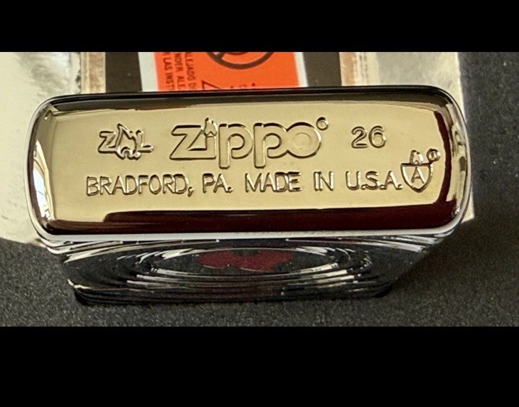 ZIPPO 2026 COLLECTIBLE OF THE YEAR, AMERICAS CARVED BLACK ICE ARMOR LIMITED 5000